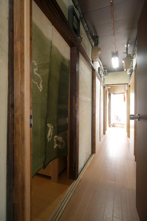 Guesthouse Oasis Осака Экстерьер фото